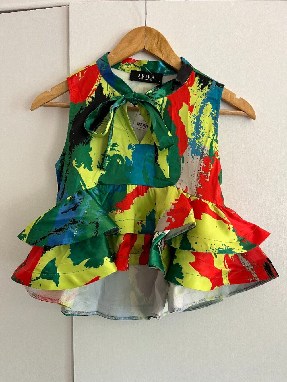 AKIRA Abstract Paint Splatter Ruffle Peplum Tie Neck Blouse - S
